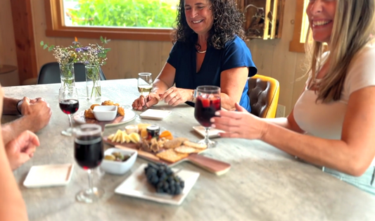 People enjoying a wine tasting at Rose Bank Winery
